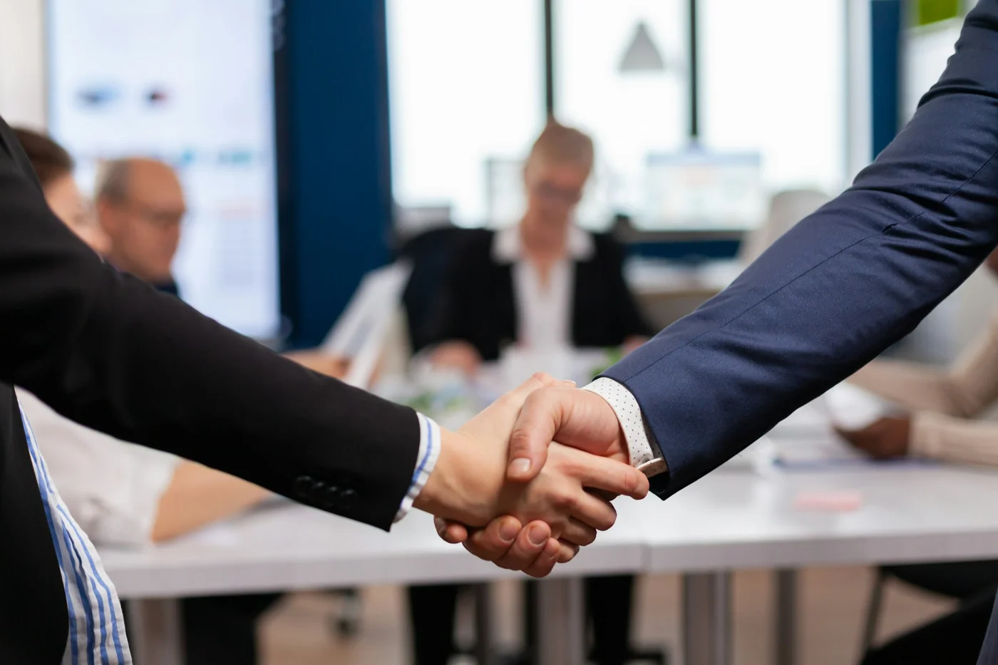 Business leaders building a trusted partnership